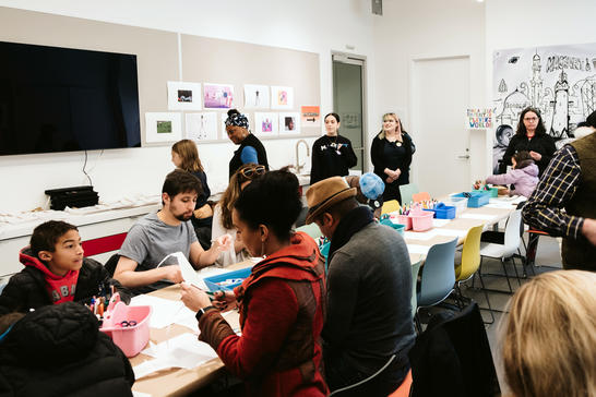 Visitors gather for artmaking in the Barkan Family Studio