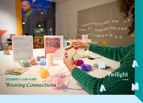 Twilight at MAAM: image of two visitors in the Big Ideas studio, one person is seated holding a small cardboard loom