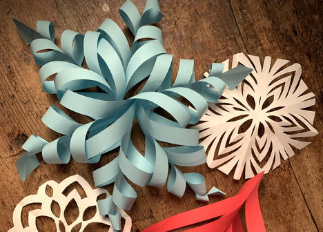 cut and folded paper winter decorations.