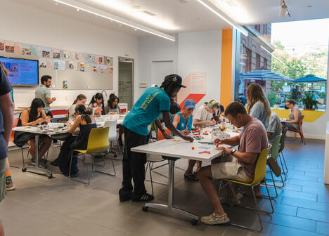 Museum visitors engaging with hands-on activities in the Barkan Family Big Ideas Studio