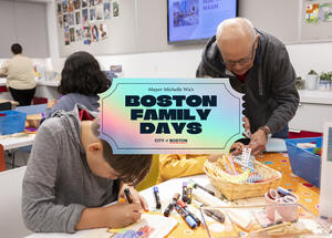 Children and adults do crafts at a table; a sign reads Boston Family Days, City of Boston.