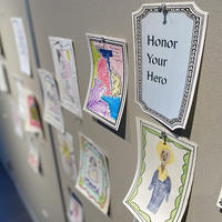 Artwork pinned up in the Big Ideas Studio from the Honor your Hero activity.